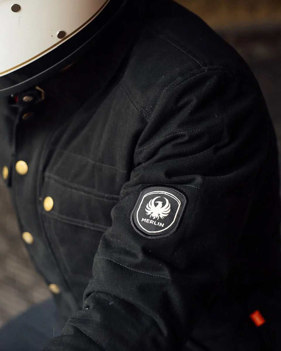 Merlin Codsall Riding Jacket - Black worn by model showing logo detail