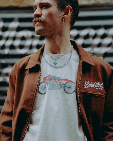 model wearing BSMC Guzzi Motorcycle ESTD. T-Shirt - Cream 