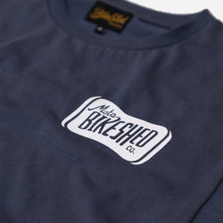 Navy blue t-shirt with 'Moto Bikeshed co'  logo - front detail