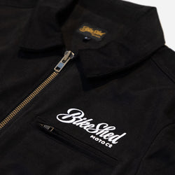 black twill motorcycle jacket with 'Bike Shed Moto Co' logo detail