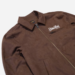 Brown twill motorcycle jacket with a Bike Shed Moto Co brand logo on a white background