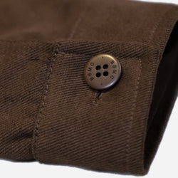 Close-up of a brown twill motorcycle jacket cuff