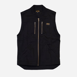 Black motorcycle vest with gold zippers and a Bike Shed Moto Co Logo on a white background