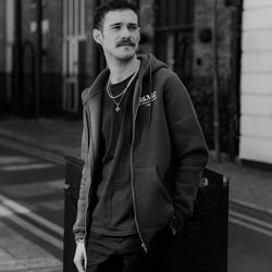 Model wearing Green Bike Shed Motorcycle Co. Good Times Hooded Sweatshirt 