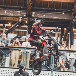Model wearing burgundy Good Times Motorcycle Logo T-Shirt
